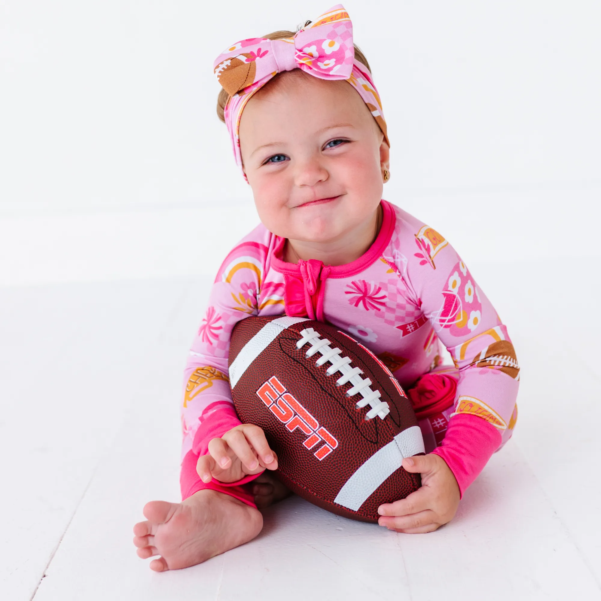 On Game Days We Wear Pink Convertible Footies with Ruffle